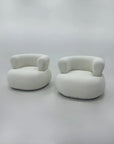 Elegant designer lounge chair in luxury fabric for living room or lounge